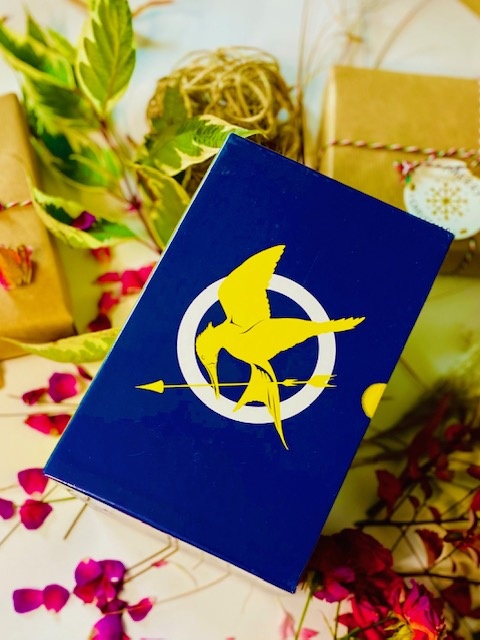 The Hunger Games by Suzanne Collins The Hunger Games by Suzanne Collins
