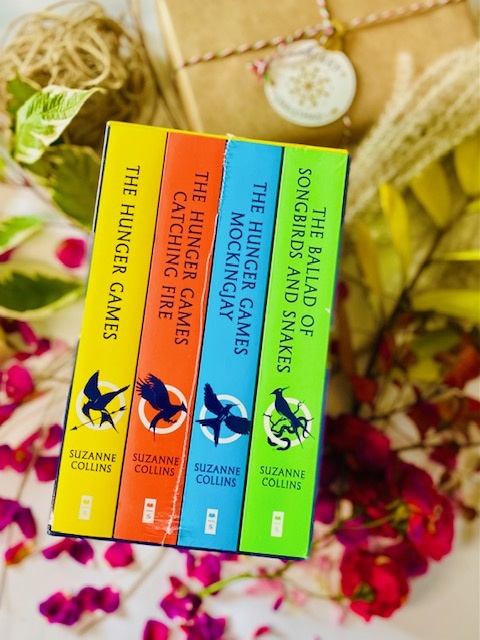 The Hunger Games by Suzanne Collins The Hunger Games by Suzanne Collins